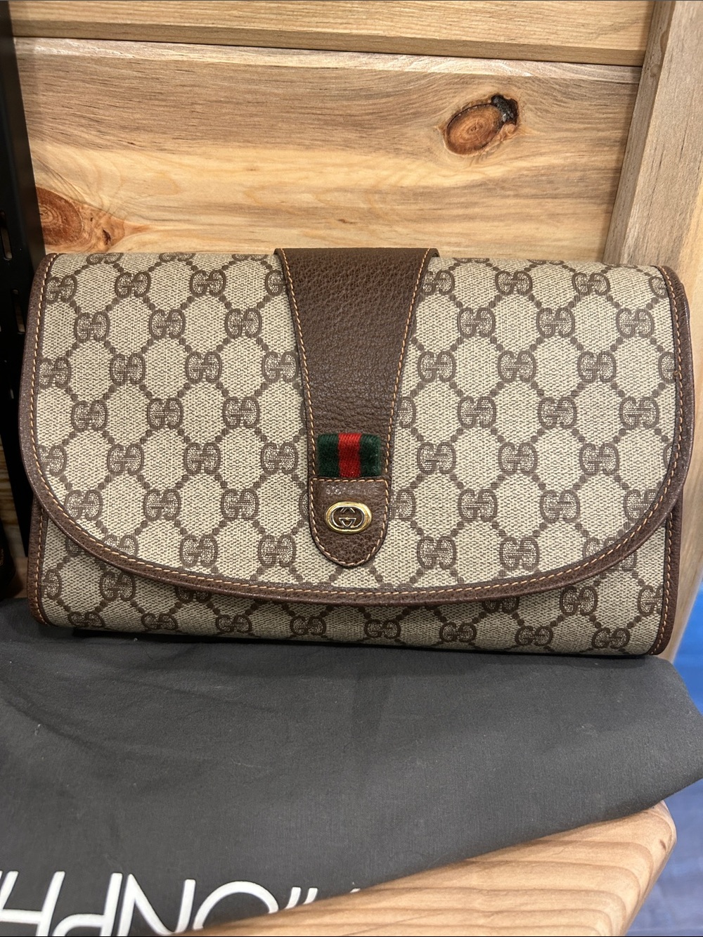Gucci Supreme Clutch